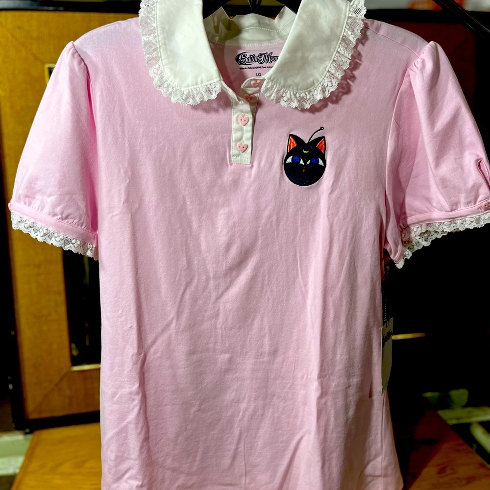 SailorMoon  Luna, Pink, Collared Top
Size Large, NWT